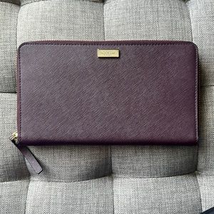 NWOT! Never used! Kate Spade plum colored extra large wallet.
